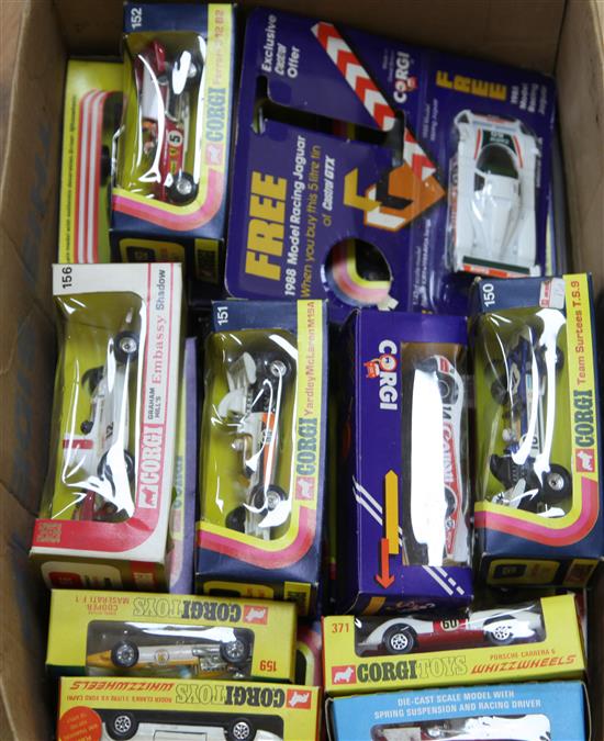 Twenty one Corgi models of racing cars, all boxed